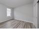 Bright bedroom with luxury vinyl plank flooring and neutral wall colors at 1617 Littleleaf Loop, North Myrtle Beach, SC 29582