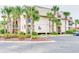 Building exterior showcasing landscaping and parking at 1582 S Waccamaw Dr. # 10, Murrells Inlet, SC 29576