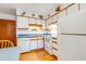 Kitchen featuring white cabinets and nautical-themed decor at 1582 S Waccamaw Dr. # 10, Murrells Inlet, SC 29576