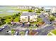 Aerial perspective of building, parking, and surroundings at 1582 S Waccamaw Dr. # 10, Murrells Inlet, SC 29576