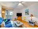 Cozy living room with comfortable seating and a balcony view at 1582 S Waccamaw Dr. # 10, Murrells Inlet, SC 29576