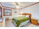 Main bedroom with a king-size bed and en-suite bathroom at 1582 S Waccamaw Dr. # 10, Murrells Inlet, SC 29576