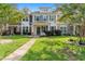 Two-story home with landscaped yard and walkway at 444 Papyrus Circle # 444, Little River, SC 29566
