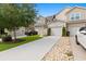 Exterior of townhome with driveway and landscaping at 444 Papyrus Circle # 444, Little River, SC 29566