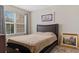 Bedroom with a double bed and large window at 444 Papyrus Circle # 444, Little River, SC 29566
