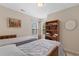 Bedroom with twin beds and bookshelf at 444 Papyrus Circle # 444, Little River, SC 29566