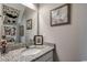 Clean and modern bathroom with granite countertop and updated fixtures at 3507 Fountain Ln., Myrtle Beach, SC 29577