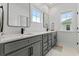 Modern bathroom with gray cabinets and quartz countertops at 2056 Summer Rose Ln., Myrtle Beach, SC 29579