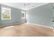 Spacious bedroom with hardwood floors and multiple windows at 2056 Summer Rose Ln., Myrtle Beach, SC 29579