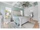 Main bedroom with a large bed and light green color scheme at 2056 Summer Rose Ln., Myrtle Beach, SC 29579