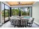 Relaxing screened porch overlooking the pool and backyard at 2056 Summer Rose Ln., Myrtle Beach, SC 29579
