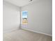 Unfurnished bedroom with neutral carpet and a large window at 151 Six Mile Creek Dr., Georgetown, SC 29440