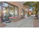 Quaint storefronts with brick exteriors, sidewalk seating, and signage at 151 Six Mile Creek Dr., Georgetown, SC 29440