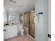 Bathroom with walk-in shower and granite countertop at 14290 Ocean Hwy. # 208, Pawleys Island, SC 29585