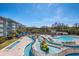Aerial view of resort pool, water features, and loungers at 14290 Ocean Hwy. # 208, Pawleys Island, SC 29585
