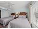 Guest bedroom with two double beds and window with blinds at 14290 Ocean Hwy. # 208, Pawleys Island, SC 29585