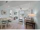 Bright living room with light walls and a dining area at 14290 Ocean Hwy. # 208, Pawleys Island, SC 29585
