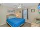 Comfortable bedroom with a queen bed and large window at 6001 - 1819 S Kings Hwy., Myrtle Beach, SC 29575