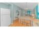 Open kitchen with dining area, and view into the living room at 6001 - 1819 S Kings Hwy., Myrtle Beach, SC 29575