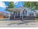 One-story home with a covered porch and ramp access at 6001 - 1819 S Kings Hwy., Myrtle Beach, SC 29575