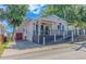Charming single-story home with a spacious porch and attached garage at 6001 - 1819 S Kings Hwy., Myrtle Beach, SC 29575