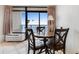 Dining area with small table and four chairs, ocean view at 1501 S Ocean Blvd. # 1135, Myrtle Beach, SC 29577