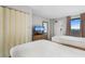 Bedroom with two beds, dresser, and ocean view at 1501 S Ocean Blvd. # 1135, Myrtle Beach, SC 29577
