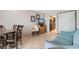 Living area with sofa, dining area, and kitchen view at 1501 S Ocean Blvd. # 1135, Myrtle Beach, SC 29577