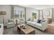 Open living room and dining area with hardwood floors and neutral decor at 616 Blackthorne Circle Nw, Calabash, NC 28467