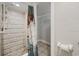 Shower with white brick walls and pebble floor at 605 36Th Ave. S, North Myrtle Beach, SC 29582