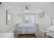 Bright bedroom with a comfortable double bed and a ceiling fan at 605 36Th Ave. S, North Myrtle Beach, SC 29582