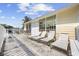 Spacious deck with multiple chairs and loungers perfect for relaxing at 605 36Th Ave. S, North Myrtle Beach, SC 29582