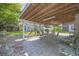 Covered patio with table, chairs, and grill at 605 36Th Ave. S, North Myrtle Beach, SC 29582