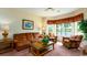 Comfortable living room with bay window and water views at 4508-E Ailsa Ct. # 4508-E, Myrtle Beach, SC 29579