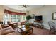 Bright living room with large windows and comfortable seating area at 4508-E Ailsa Ct. # 4508-E, Myrtle Beach, SC 29579