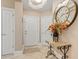 Elegant entryway with a large clock and decorative console table at 2180 Waterview Dr. # 634, North Myrtle Beach, SC 29582