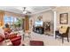 Spacious living room with a large TV and access to balcony at 2180 Waterview Dr. # 634, North Myrtle Beach, SC 29582