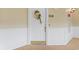 Condo entry with white door and decorative wreath at 2180 Waterview Dr. # 634, North Myrtle Beach, SC 29582