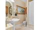 Clean bathroom with pedestal sink and shower/tub combo at 2180 Waterview Dr. # 634, North Myrtle Beach, SC 29582