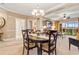 Elegant dining area with a granite-topped table and view to living room at 2180 Waterview Dr. # 634, North Myrtle Beach, SC 29582