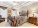 Relaxing bedroom with a large bed and ceiling fan at 2180 Waterview Dr. # 634, North Myrtle Beach, SC 29582