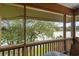 Screened balcony overlooking a lake and houses at 410 Melrose Pl. # 309, Myrtle Beach, SC 29572