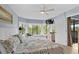 Bright bedroom with king bed, private access to balcony, and en suite bath at 410 Melrose Pl. # 309, Myrtle Beach, SC 29572