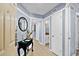 Bright condo entryway with light-colored walls and wood-look floors at 410 Melrose Pl. # 309, Myrtle Beach, SC 29572