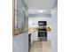 Modern kitchen with stainless steel appliances and granite countertops at 410 Melrose Pl. # 309, Myrtle Beach, SC 29572