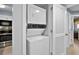 Stackable washer and dryer in a dedicated closet at 410 Melrose Pl. # 309, Myrtle Beach, SC 29572