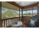 Relaxing screened balcony with seating and water views at 410 Melrose Pl. # 309, Myrtle Beach, SC 29572