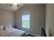 Cozy bedroom with a double bed and window with blinds at 6103 Cates Bay Hwy., Conway, SC 29527