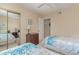 Comfortable bedroom with two twin beds, dresser and mirrored closet at 8862 Cloister Dr. # F, Myrtle Beach, SC 29575