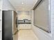 Small kitchenette with stainless steel appliances at 5801 Oyster Catcher Dr. # 434, North Myrtle Beach, SC 29582
